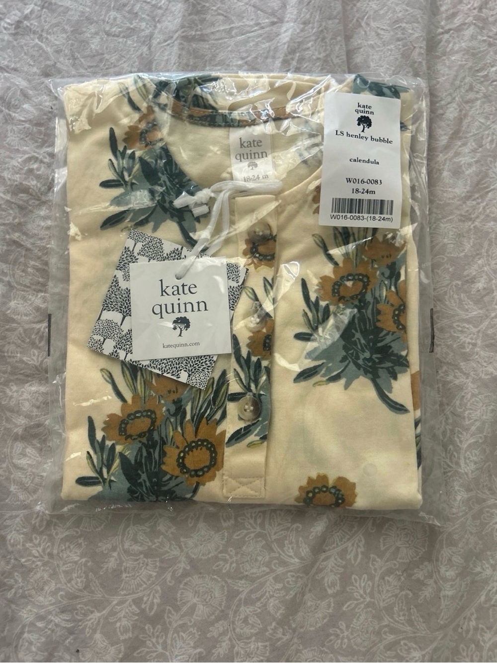 Kate Quinn Long Sleeve Henley Bubble Calendula